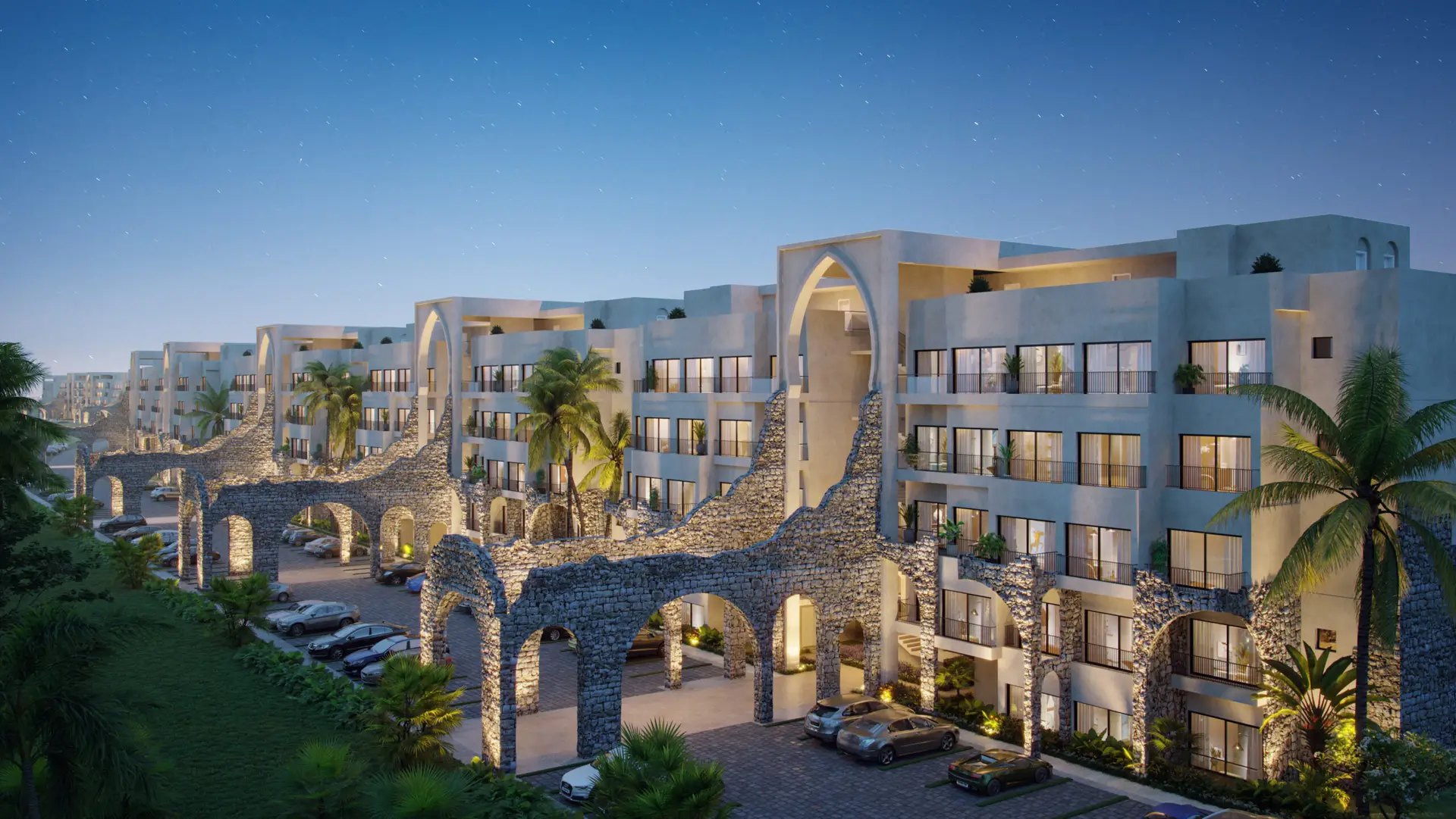 Rendering at dusk of Poseidonia's arcaded blocks and parking in gated Cana Bay, about 5 miles in a straight line from Los Corales.